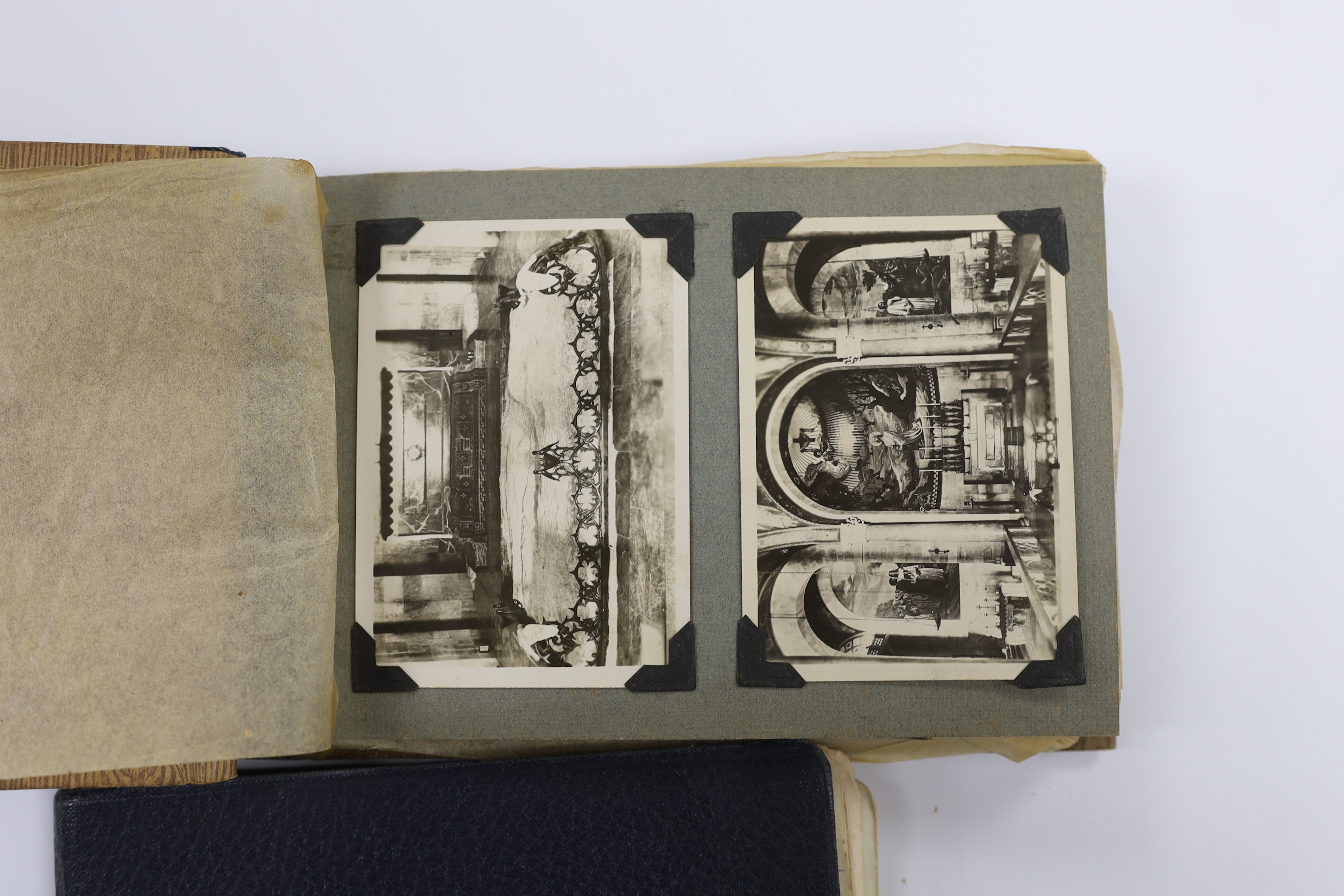Two albums of early 20th century postcards and black and white photographs, many with naval interest, including photographs of battleships, and naval manoeuvres, during the 1930s, scenes of Bermuda, portraits of soldiers
